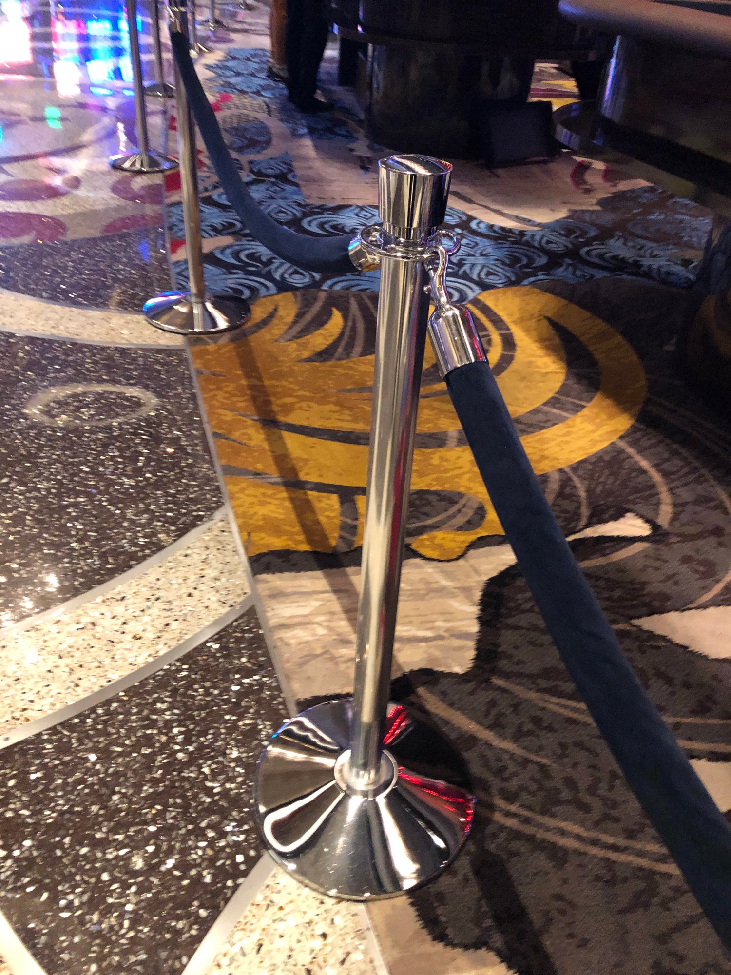 Urn top post and rope barrier line
